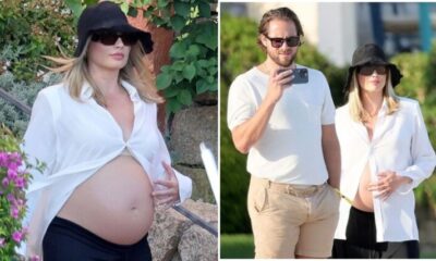 Pregnant Margot Robbie Shows Off Her Bare Baby Bump as She Vacations with Husband Tom Ackerley in Sardinia as they prepare for the arrival of their little one.