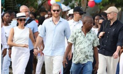 Meghan was a vision in white as she and Prince Harry speaks about goodnews while spotted visiting Palenque on the third day of their trip to Colombia... see more