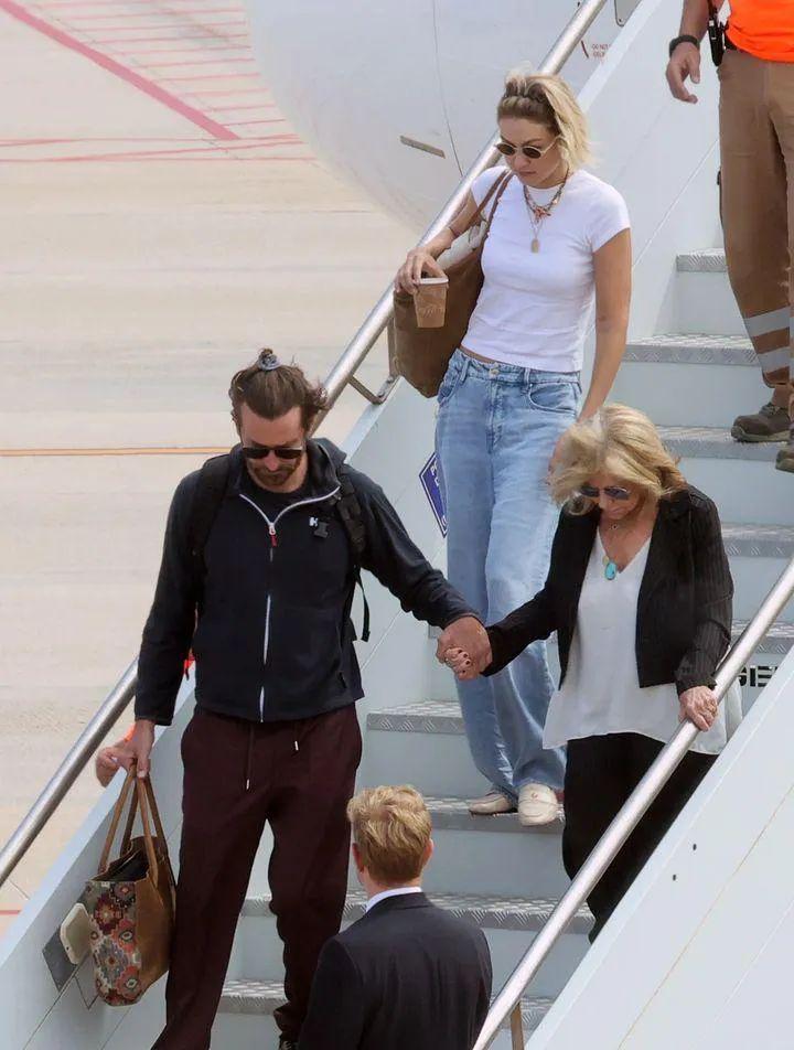 Bradley Cooper and his mother have recently arrived in Sardinia, Italy, for what appears to be a charming getaway. The duo is spotted enjoying the picturesque landscapes and serene atmosphere of the Italian island. Interestingly, Gigi Hadid is also in the mix, seemingly joining the pair on their vacation. While Cooper and his mother are likely soaking up the cultural and natural beauty of Sardinia, Hadid's presence adds a layer of intrigue to their trip. This unexpected trio is making headlines, with some noting the interesting dynamic of the celebrity pairing. Sardinia, known for its stunning coastlines and vibrant local culture, provides a picturesque backdrop for their getaway.